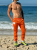 Shiny Sweatpants Orange2.png